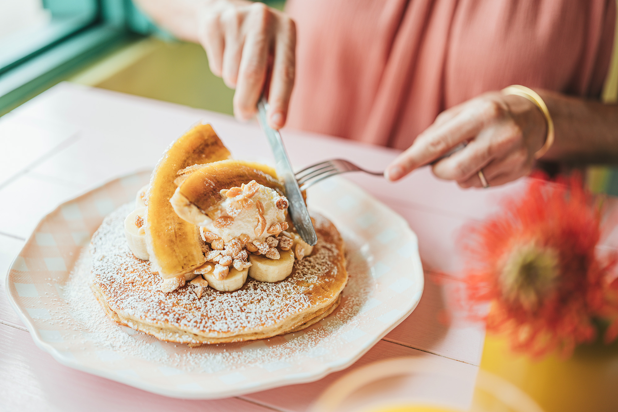 Person and pancakes