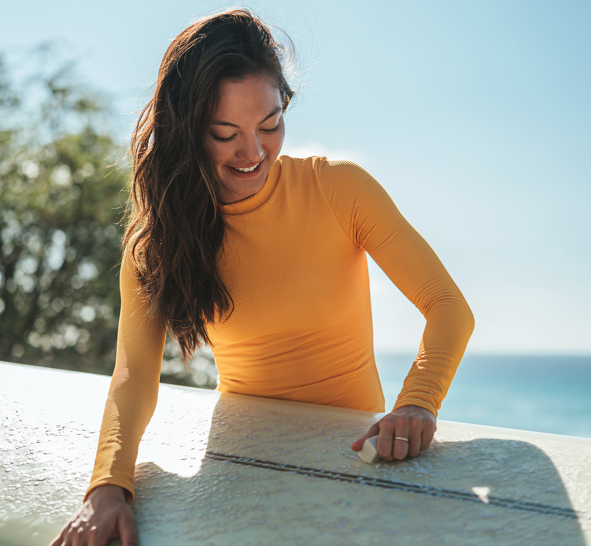 Girl Holding Surfboard