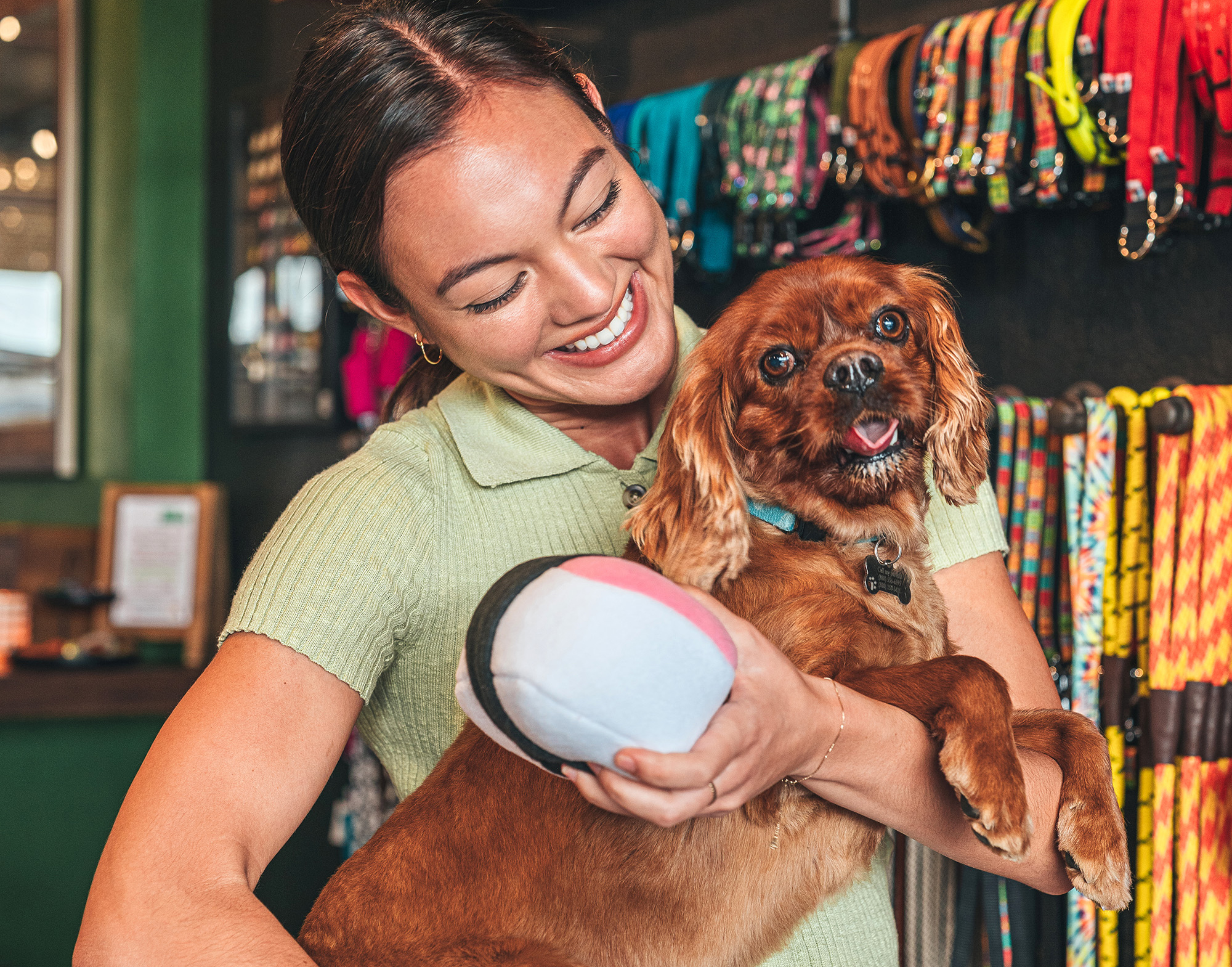 Girl Holding Dog